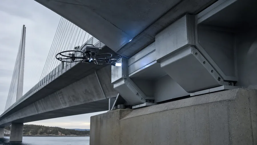 Inspection drone examining a cable-stayed bridge